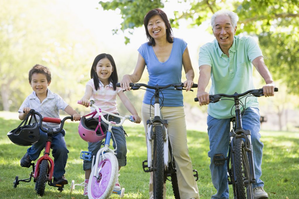 grandparents and kids riding bikes